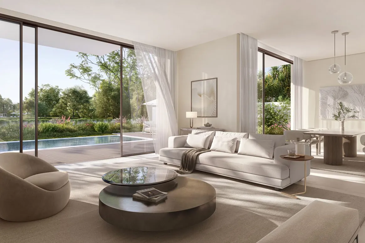 Open-plan living and dining room opening onto the pool
